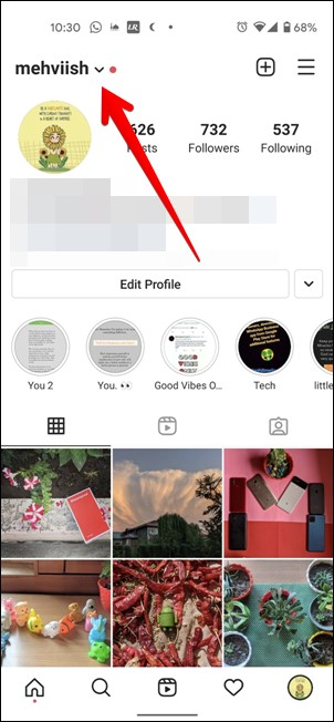 red dot on home icon instagram screenshot with a arrow